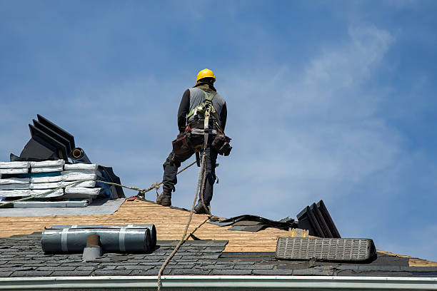Professional Gutter Installation technician working in Paxico, KS